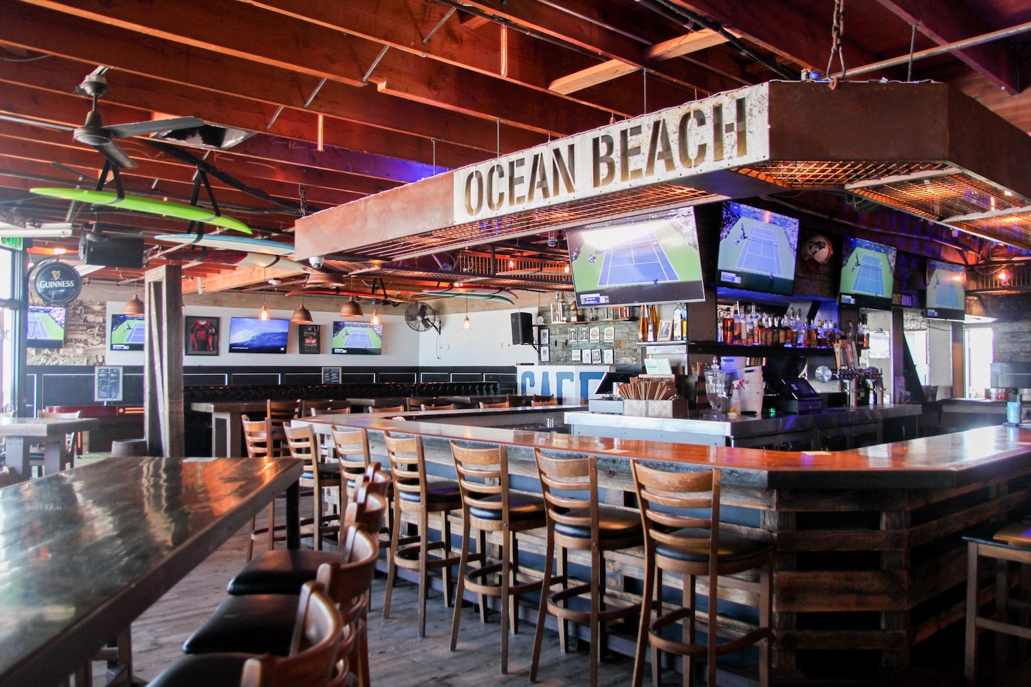 Wonderland Ocean Pub with Beach Views and Sunset Cocktails